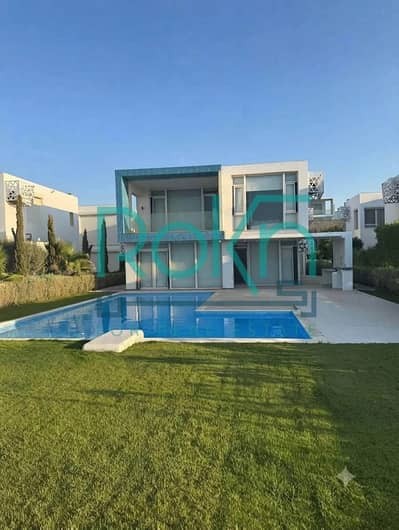 Ultra-modern standalone villa for sale in Fouka Bay—front-row sea view with a private pool. Located on the project's prime elevated terrace, offering