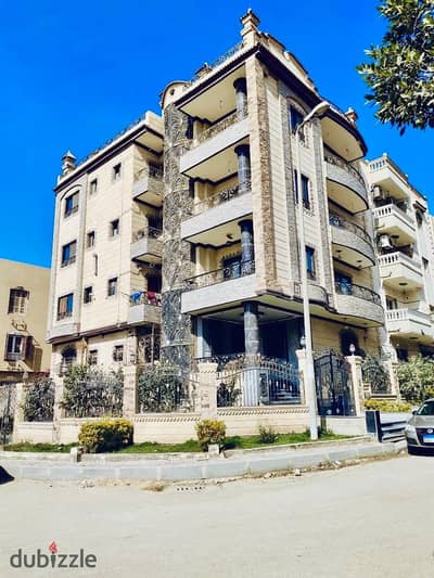 Building for sale 300m corner in the eighth district extension of Al-Sha'rawy Street in the city of Al-‘Obour