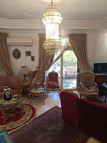 Opportunity to sell a special apartment on the ground floor with a fully planted garden, with an area of 180 meters and two private entrances inside | Opera City Compound – Sheikh Zayed