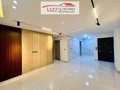 Ground floor apartment with a beautiful garden for cash sale in Madinaty B11, ultra super luxury finishing