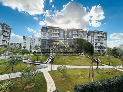 Apartment for sale in Madinaty, 80 sqm, garden view, B14, directly in front of services with a lower down payment