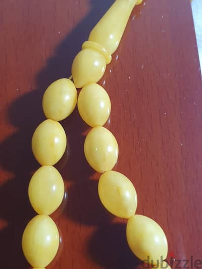 سبحة كهرمان طبيعى مصنوعة من حجر واحد (مميزة)