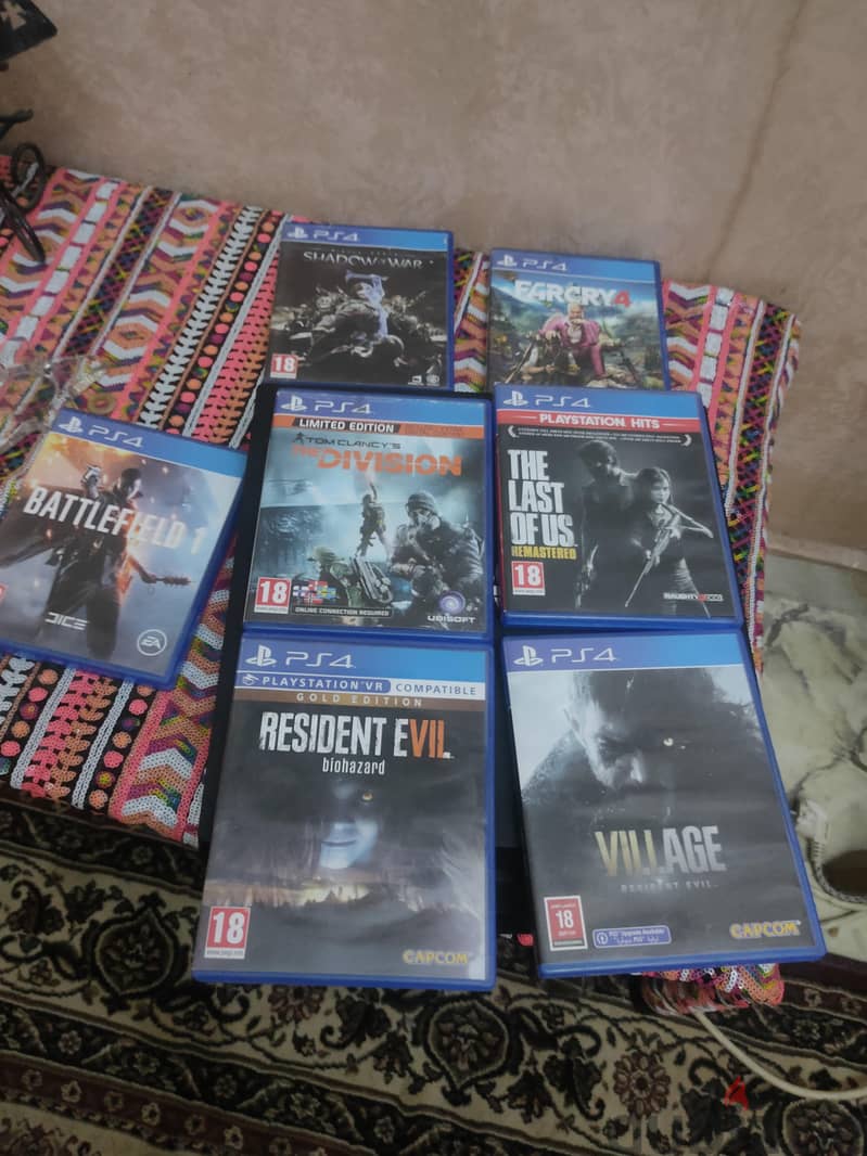 PS4 pro + 7 games + 2 controllers 1