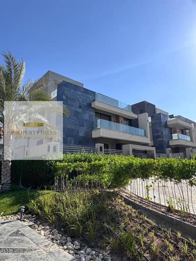 Independent villa for sale, delivery soon, area 225 square meters + garden in the Fifth Settlement near the American University and close to Al-Teseen Street