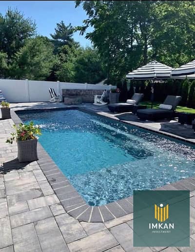 Villa for sale in Patio Town Compound, Fifth Settlement—ready for viewing. Area: 310 sqm. Down payment: 3 million; installment plan over 9 years. Loca