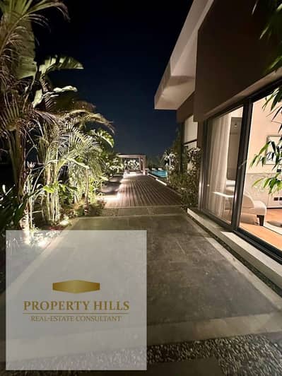 Less than its price, a villa next to the American University, in installments, only in the highest component of villas with a landscape view in the heart of the Fifth Settlement.