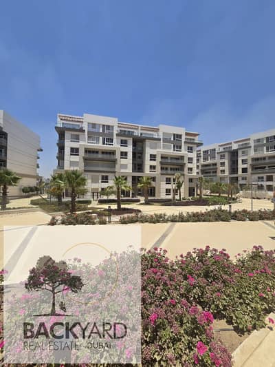 apartment in Hyde Park Fifth settlment, Golden Square, near Mivida, with 5% down payment and interest-free installments up to 10 years.