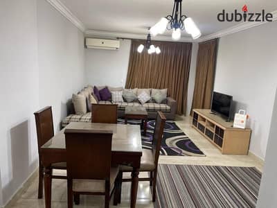 For rent: furnished apartment with a private garden in Janna Zayed Compound 1