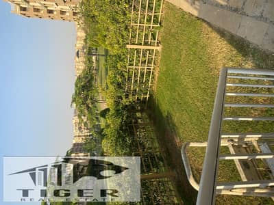 For sale, a ground-floor apartment with a garden in Madinaty, open view