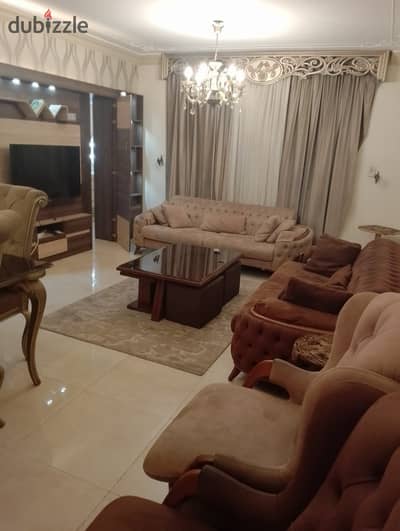 Furnished apartment for daily rent at Sheraton Airport Housing, Egypt for Construction, 3 bedrooms, 2 bathrooms, large reception, and kitchen, first floor, with a distinctive location suitable for families.