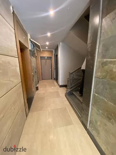 Apartment for sale at a special price, fully sea-facing with a landscape view, located in the heart of New Cairo's Fifth Settlement in the Golden Squa