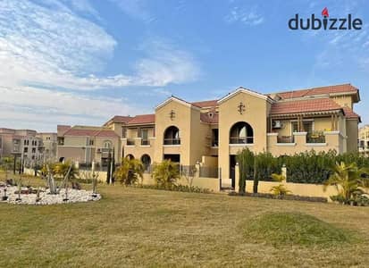 Villa for sale, ready for immediate handover, in a prime location featuring a north-facing view and overlooking green spaces.