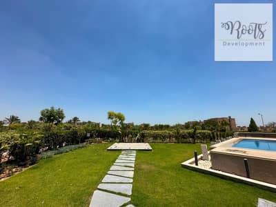 For sale A Super Lux finished villa with ACs ,garden,and a pool. It overlooks the largest green area in the compound—in Moon Land, Shiekh zayed