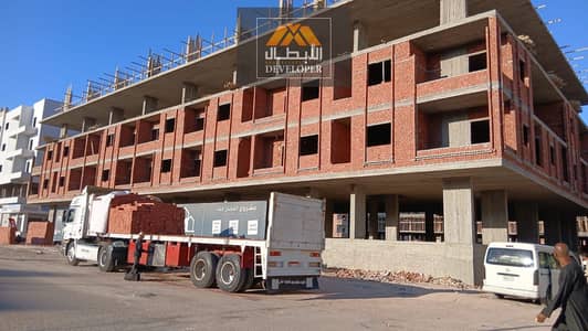 80m² 2BR fully finished apartment with pool view in El Hejaz Gate Compound, Hurghada—4-year installment plan or 20% cash discount, Green Contract