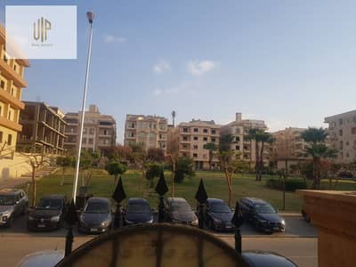 Apartment for sale in Al-Banafsaj buildings with a private entrance and a private garden with a garden view, near Waterway and Al-Teseen Street, minutes from Al-Rehab and the Suez Road