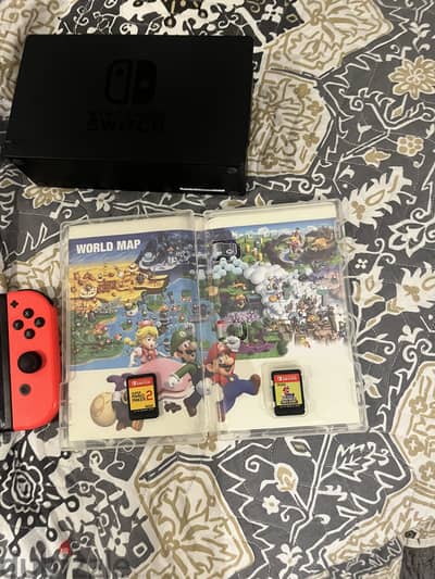 Nintendo Switch 1 with dock and 2 games
