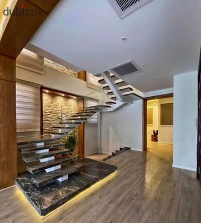 A 3-story standalone villa for sale next to Madinaty Butterfly on the Amal Axis Mostakbal City near Sarai at East.