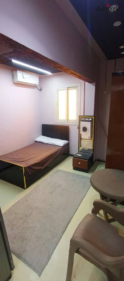 Furnished studio for rent in 6 October, First District, Steps to the exclusive parking and the university N