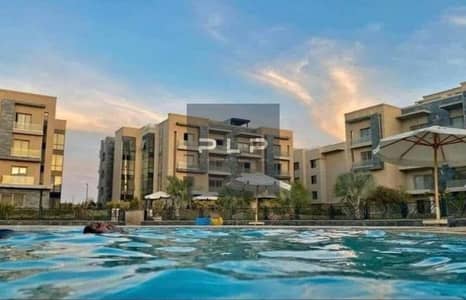 Resale apartment with a garden, ready to moveE, at the lowest market price in Galleria Moon Valley Compound.