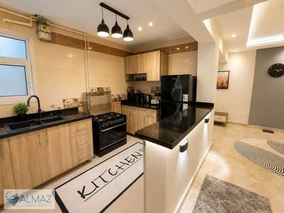 Furnished apartment with a garden for rent in the Janna Compound, Fifth Settlement, near the American University (AUC) campus and South 90th Street