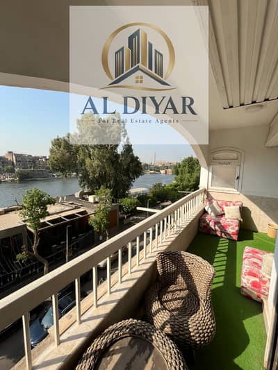 شقة مفروشة على النيل للإيجار شارع أبو الفدا الرئيسى الزمالك                                                                                          ,