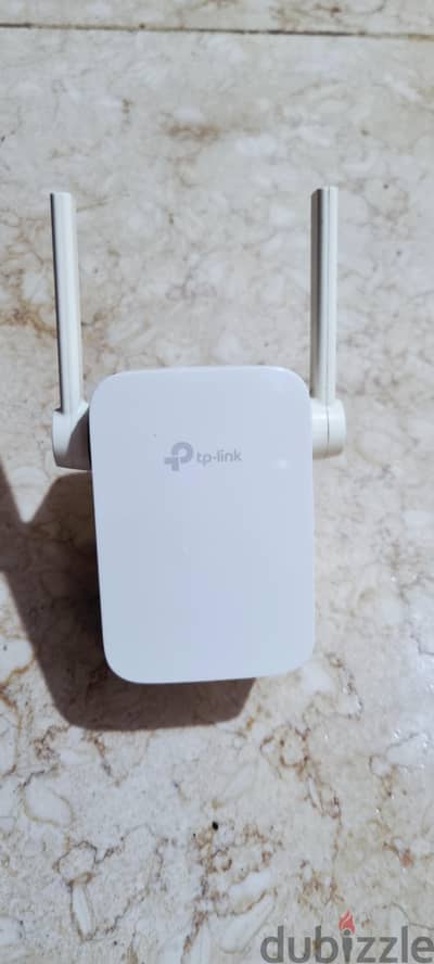 tp link extender wifi  . تي بي لينك موسع نطاق شبكات واي فاي