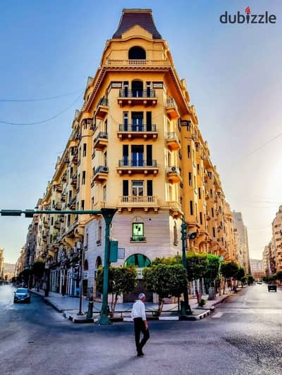 For sale in Al-Korba, property 1,100 m, facade 40 by 20 meters consisting of 16 apartments and 16 shops near Al-Ahram Street, Normandy Cinema, and Al-Horreya Mall.