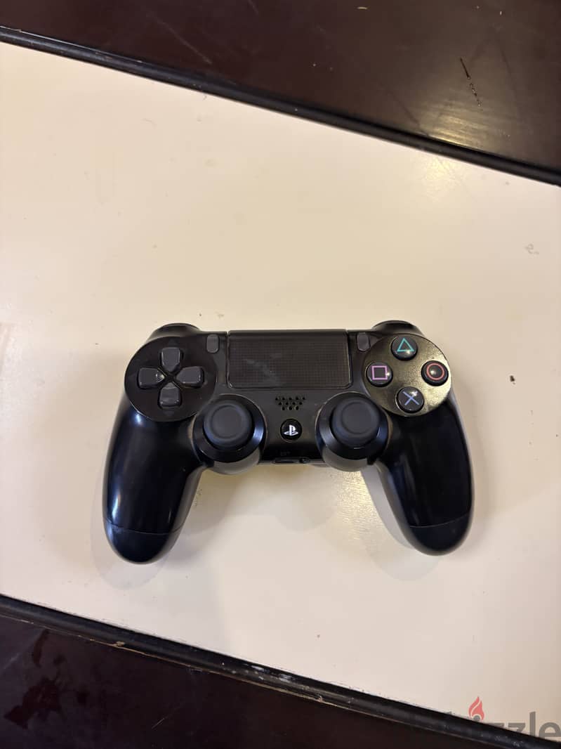 PlayStation 4 slim used ksa version 4 games 1