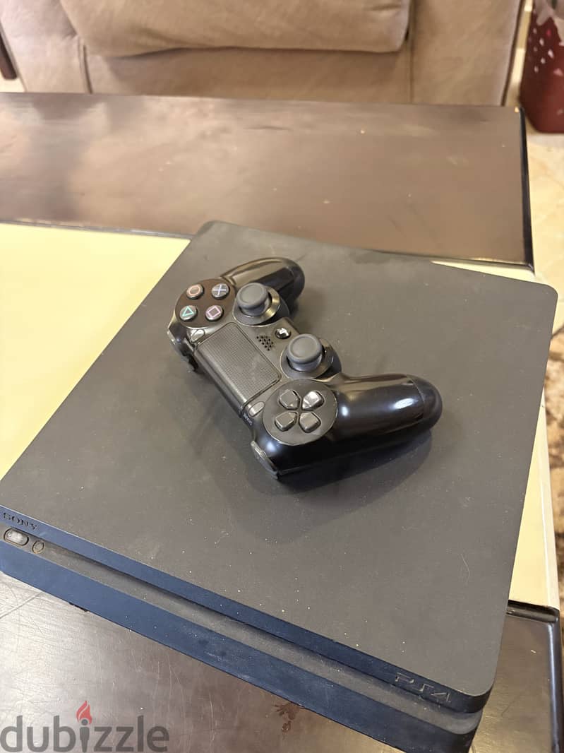 PlayStation 4 slim used ksa version 4 games 3
