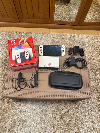 Nintendo switch Oled with 64 ssd card and traveling case