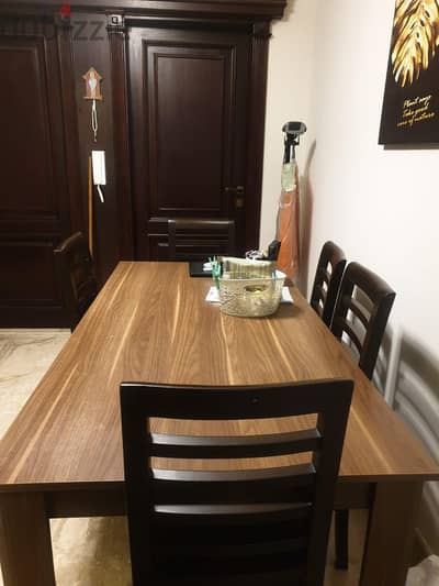 wooden table with 6 chairs