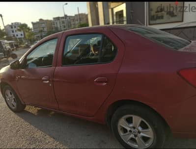 رينو لوجان 2015