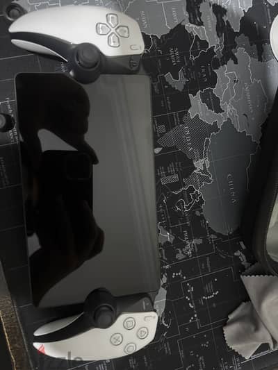PS PORTAL WITH A SCREEN COVER AND THUMBSTICK COVERS ,SAME AS NEW