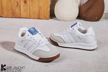 كوتشي اطفالي Adidas sama  ف اللبس مقاس 32 : 36 رمادي ابيض اسود