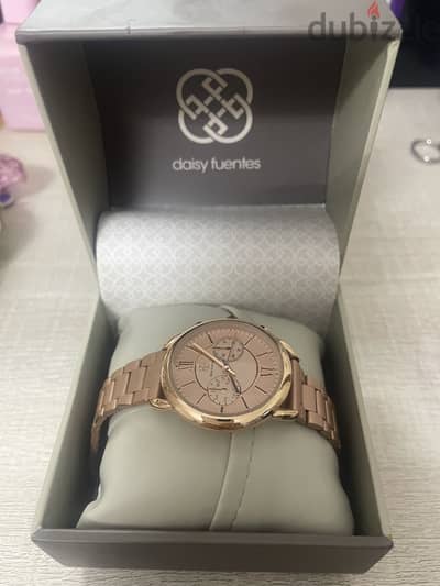 Daisy Fuentes gold rose watch just like new