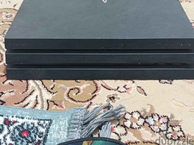PS4 PRO 1TB with 14 game discs and 2 original controllers 1
