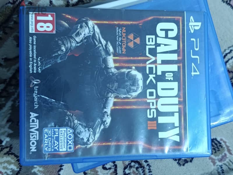 PS4 PRO 1TB with 14 game discs and 2 original controllers 3