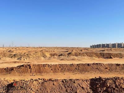 للبيع قطعة ارض ناصية ممر في بيت الوطن التوسعات الشرقية - مدينة بدر