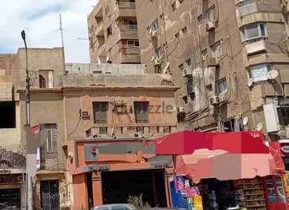 عقار سكني تجاري مسجل شهر عقاري في شارع عثمان ابن عفان مصر الجديده