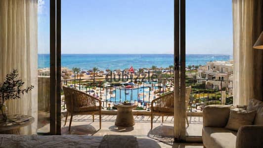 Panoramic sea & pool view chalet, fully finished with furniture, for sale with installments in a premium resort in Ain Sokhna.