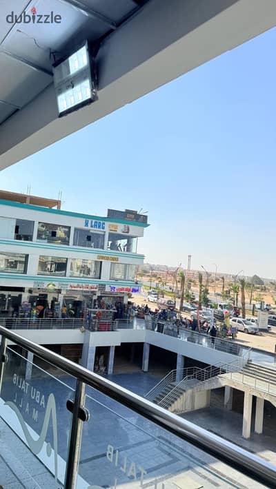 Shop for sale, first floor, distinctive area 60m, immediate delivery in the strongest location in October Gardens at the lowest price per meter and the lowest down payment with a competitive payment system.