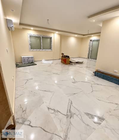 Unfurnished apartment for rent—including kitchen and air conditioning units—in "The Square" compound, Fifth Settlement.