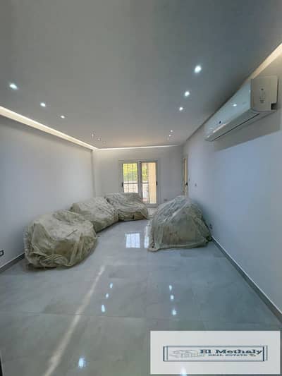 Freehold apartment for sale in Al Rehab City, New Cairo (Phase 7); features custom finishes and comes fully furnished and equipped with appliances.