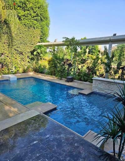 Standalone villa with a pool, fully finished, with installments over 10 years, interest-free, and a 50% discount on its price, directly on the Suez Ro