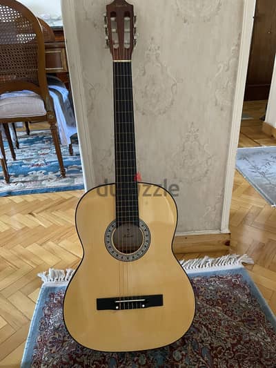 Nearly new kapok guitar for sale
