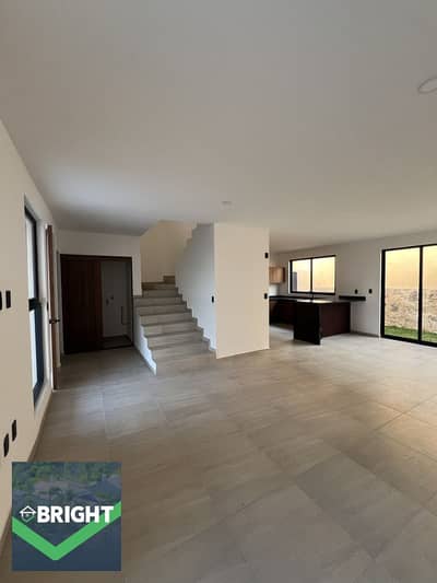 Garden Townhouse with a built-up area of 210 sqm + 107 sqm garden, Fully Finished and Ready to Move, with a total price of 26,556,198 EGP