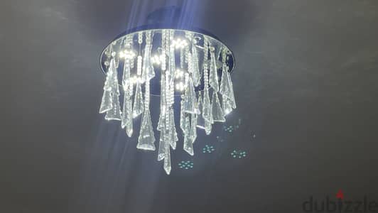 Modern crystal chandelier with spots