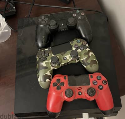 Playstation 4 with 3 controllers and gta V account