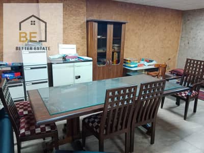 Apartment for sale, suitable for commercial or residential use, on Khalifa Al-Ma'moun Street.