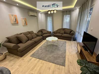 Furnished apartment for rent in Madinaty (Zone B3): 124 sqm + 45 sqm. Features custom finishing and clean, well-maintained furnishings. It enjoys a pr